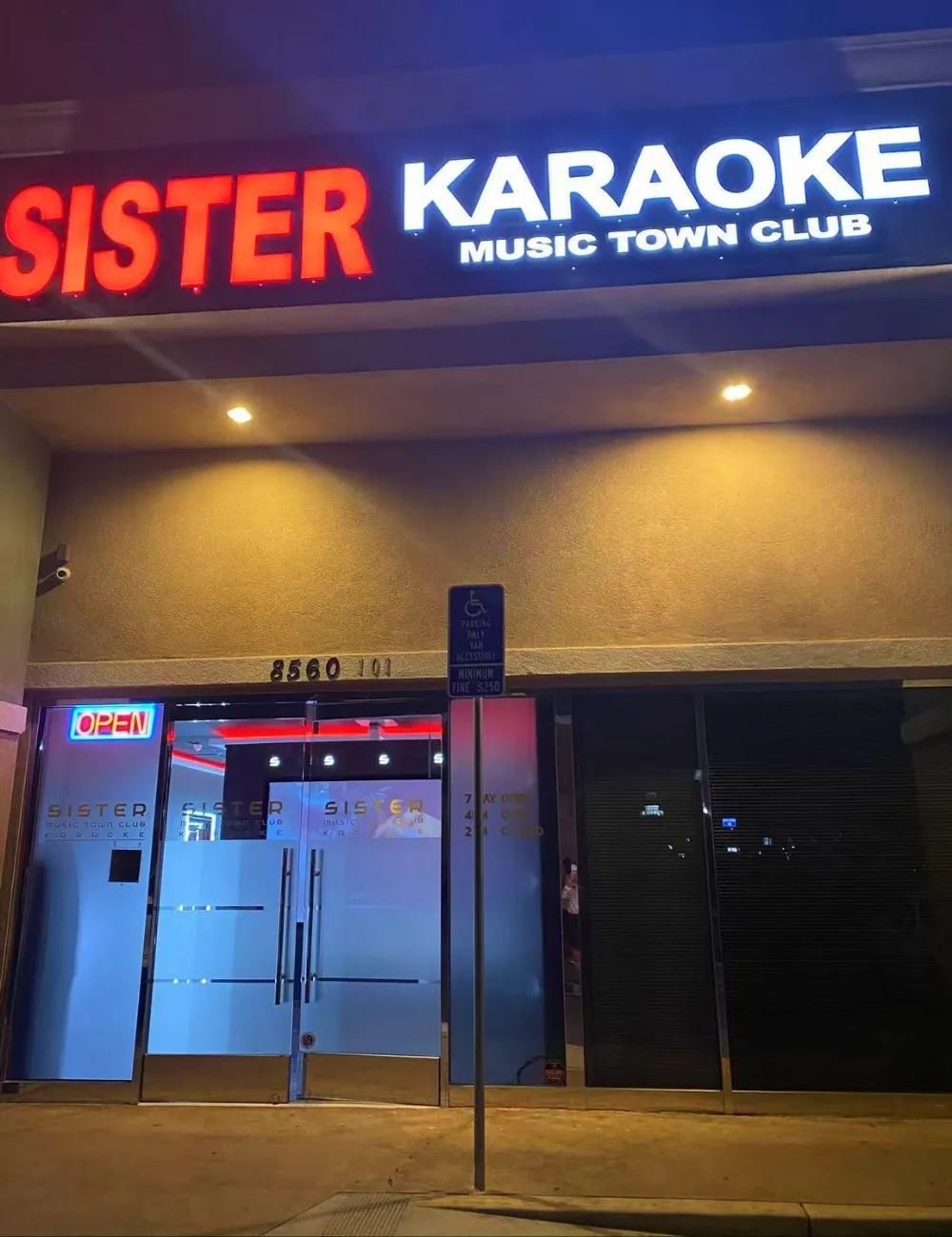 Front glass entrance of Sister Karaoke venue at Sister Karaoke, a Karaoke bar in Buena Park